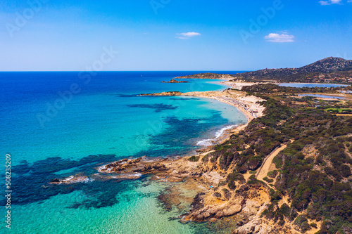 Panorama of the wonderful beaches of Chia, Sardinia, Italy. View of beautiful Chia bay and wonderful beaches, Sardinia island, Italy. Beautiful sea and bay on Su Guideu beach, Sardinia island, Italy