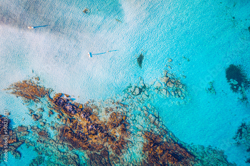 Aerial drone shot of beautiful turquoise beach with pink sand Elafonissi, Crete, Greece. Best beaches of Mediterranean, Elafonissi beach, Crete, Greece. Famous Elafonisi beach on Greece island, Crete.