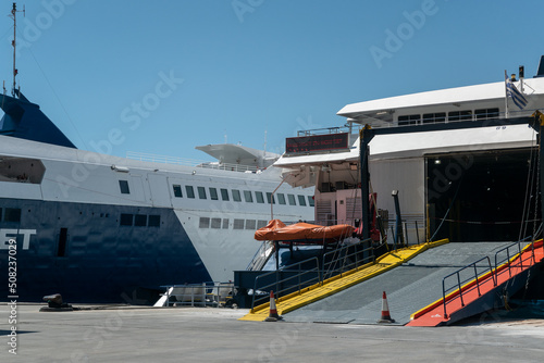 Freight and passenger ships resting at the port of Santorini in Greece