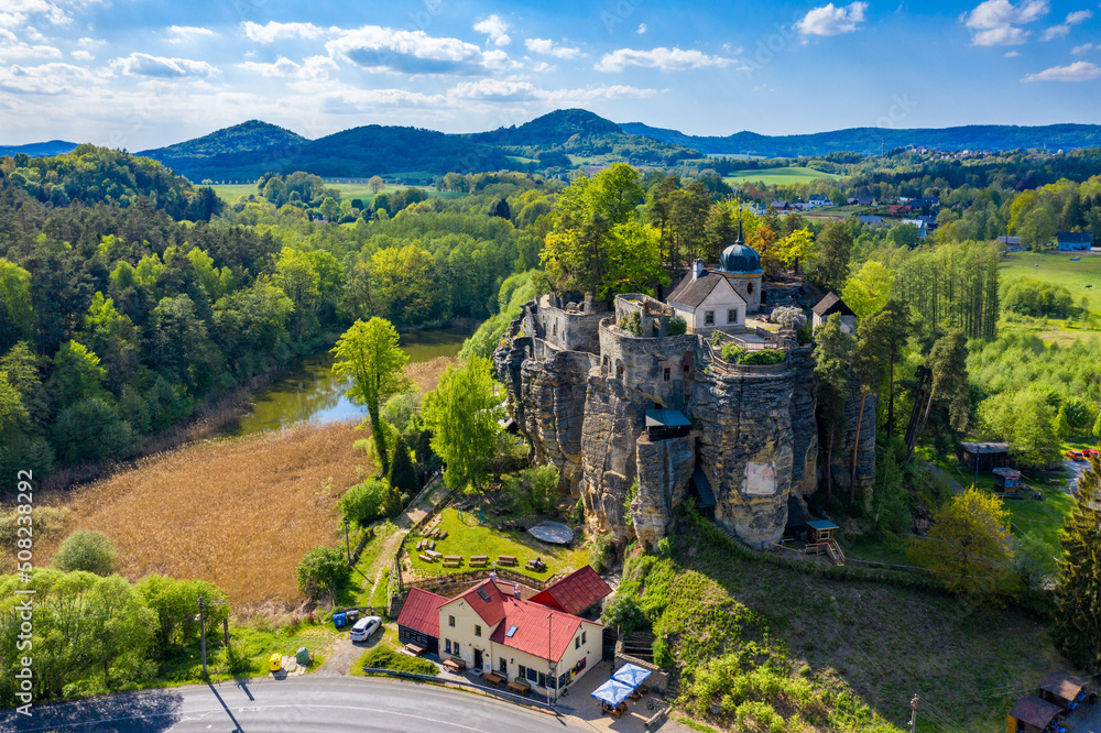Aerial view of Sloup Castle in Northern Bohemia, Czechia. Sloup rock castle in the small town of Sloup v Cechach, in the Liberec Region, north Bohemia, Czech Republic.