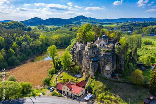 Aerial view of Sloup Castle in Northern Bohemia, Czechia. Sloup rock castle in the small town of Sloup v Cechach, in the Liberec Region, north Bohemia, Czech Republic. photo