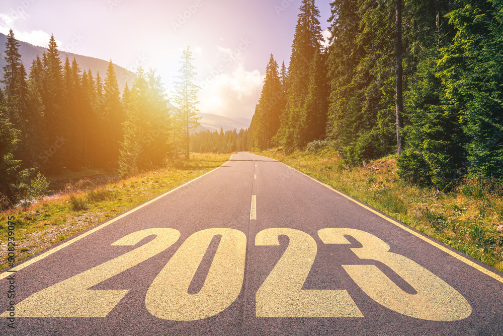 Empty asphalt road and New year 2023 concept. Driving on an empty road