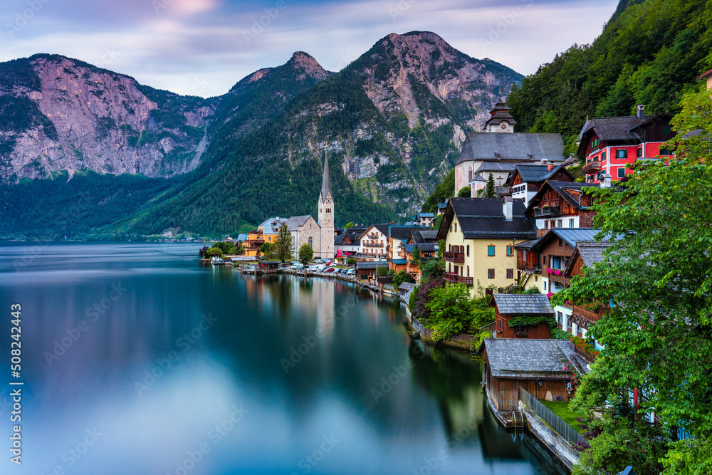 Fototapeta premium View of famous Hallstatt mountain village in the Austrian Alps at beautiful light in summer, Salzkammergut region, Hallstatt, Austria. Hallstatt village on Hallstatter lake in Austrian Alps.