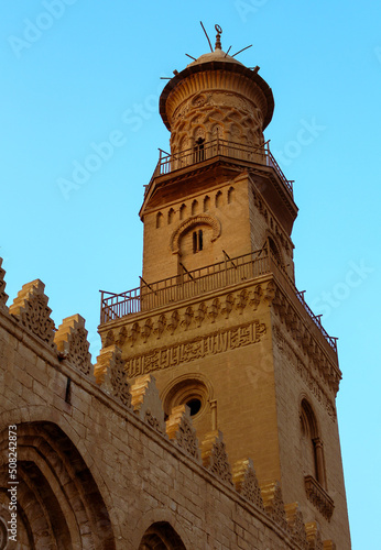 The minaret of the Madrasa of Al-Nasir Muhammad located in old Cairo, Muizz Street,Cairo,Egypt. photo
