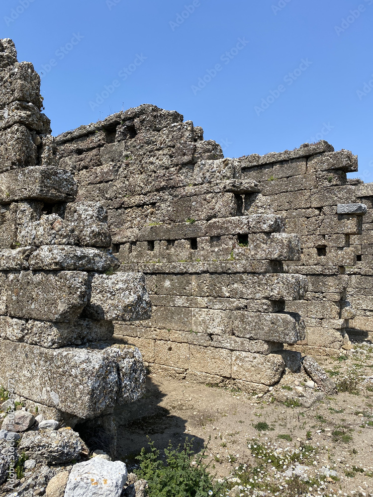 Roman amphitheater of Aspendos, Belkiz - Antalya, Turkey. Aspendos Ancient City. Aspendos acropolis city ruins, cisterns, aqueducts and old temple. 