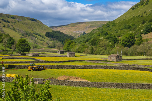 On the Coast to Coast long distance footpath walk at Muker in Swaledale in the Yorkshire Dales photo