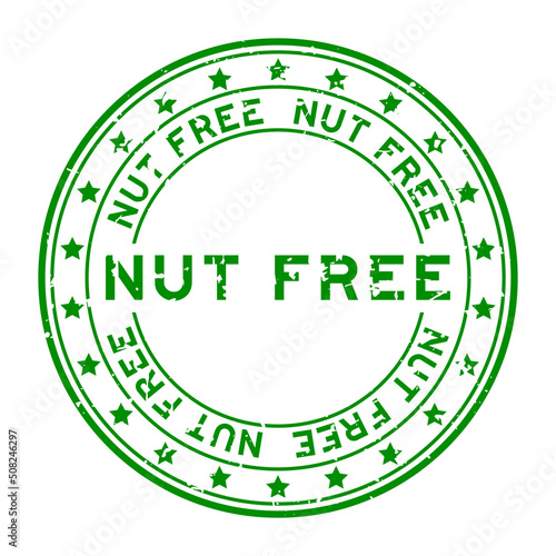Grunge green nut free word with star icon round rubber seal stamp on white background
