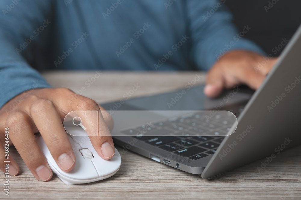 Man working with computer laptop searching browsing internet data information. Man working with computer laptop searching browsing internet data information.