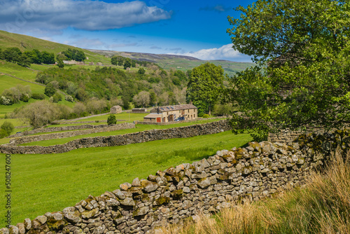 On the Coast to Coast long distance footpath walk at Muker in Swaledale in the Yorkshire Dales photo