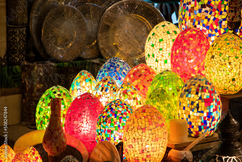 Colorful, bright, Egg shaped and metallic lamps on display in Khan Al Khalili bazaars in Al Moez street.
 photo