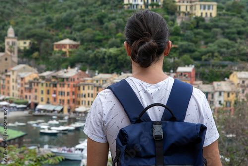 Man looking at the Portofino harbour