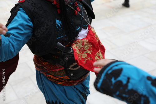 Turkey, Mugla, Mentese local cultural festival folklore (efe zeybek) men's and women's clothes photo