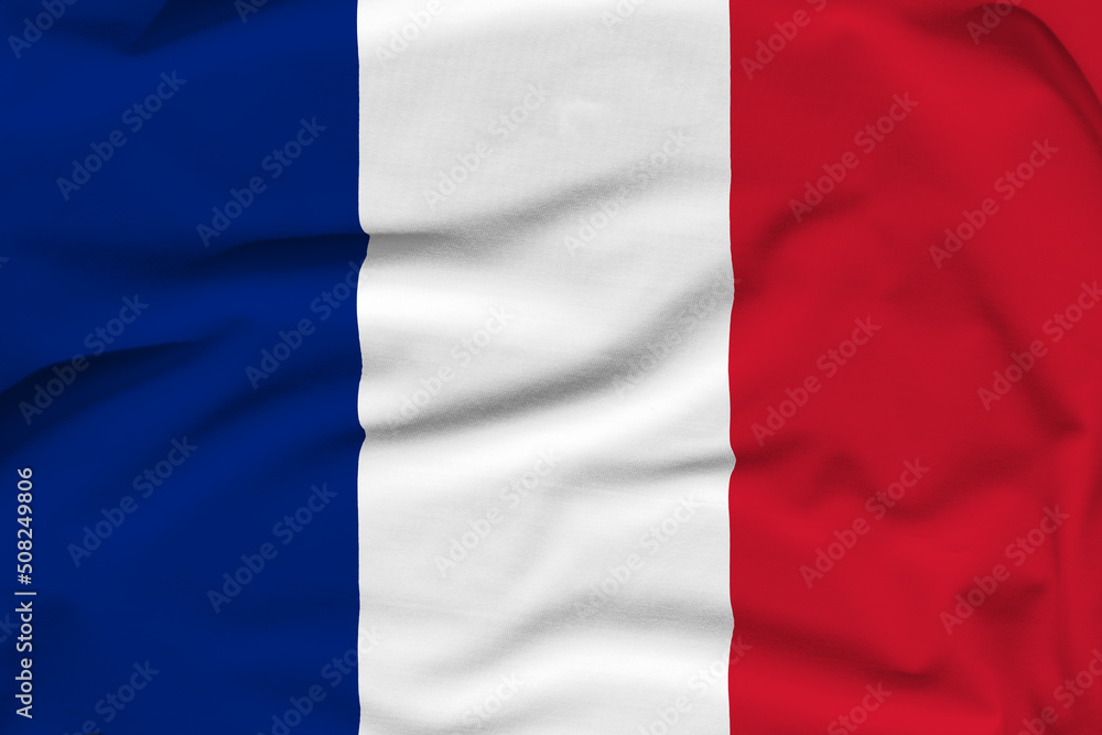 France national flag, folds and hard shadows on the canvas