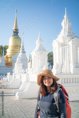 Solo travel backpack women travel in buddhist temple