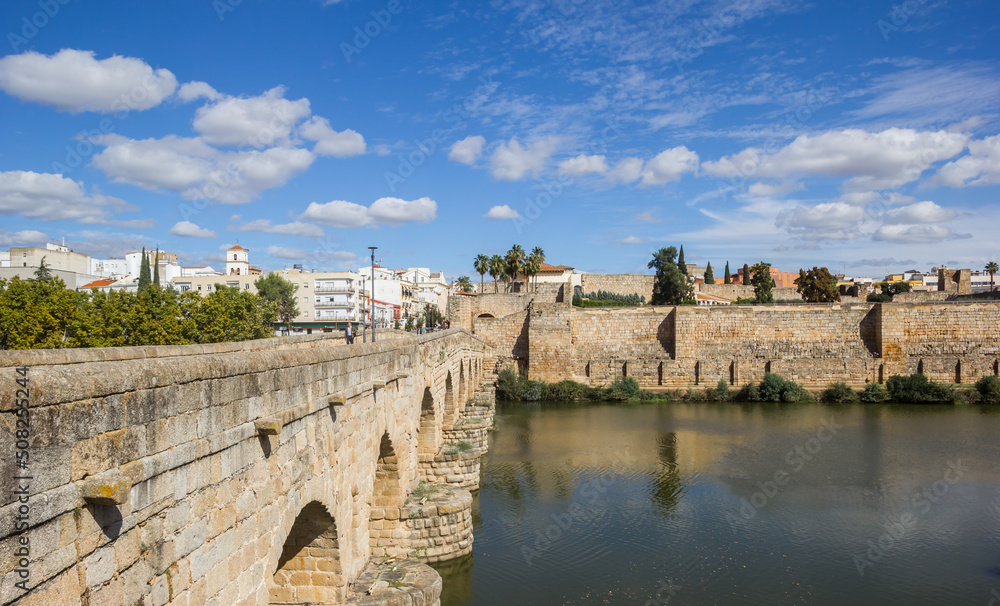 Historic roman bridge and Alcazaba at the Guadiana river in Merida, Spain