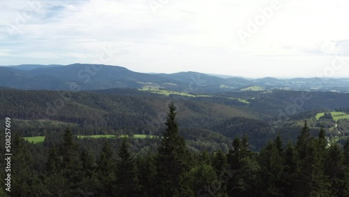 Rising up, revealing the beautiful landscape surrounding Chata Paprsek, Czech Republic, aerial photo