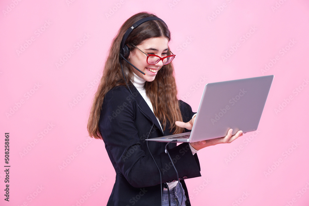 Young teen girl attending online class or doing her school work Young teen girl attending online class or doing her school work