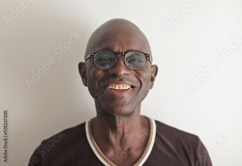 portrait of a black smiling man photo