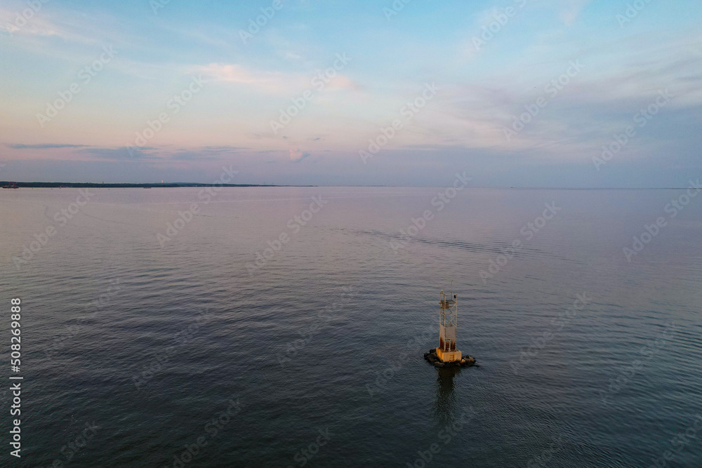 Buoy floating on calm waters
