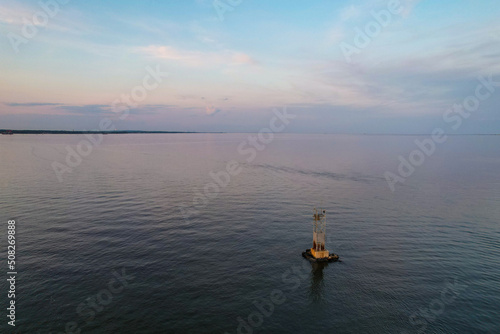 Buoy floating on calm waters