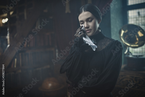 Obraz na plátně widow wiping tears