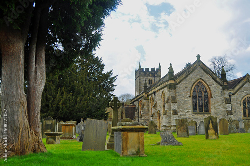 The pretty church and Churchyard in Ashford In The Water Derbyshire photo