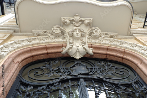 Elegant stucco molding on top of the renaissance classical door in Madrid, Spain