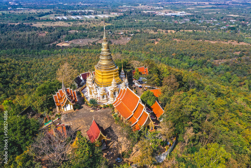 Aerial view of Wat Phra Phutthabat Tak Pha temple on top of the mountain in Lamphun, Thailand