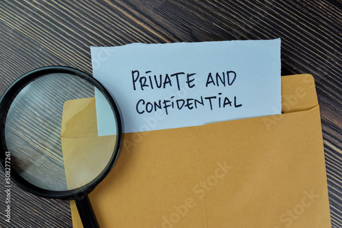 Slika na platnu Private and Confidential text on document above brown envelope and stethoscope