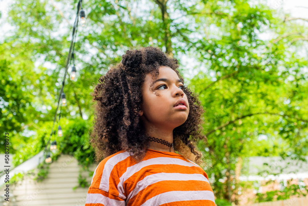 Sullen tween enviromental lifestyle portrait Sullen tween enviromental lifestyle portrait