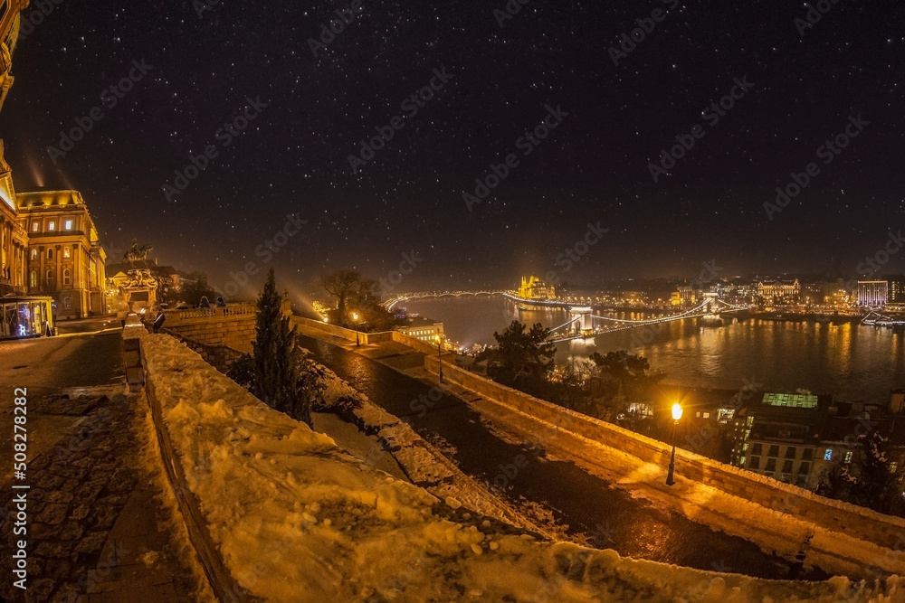 Night view of the city, across the Danube River. Budapest, Hungary