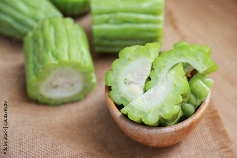 bitter gourd slices in bowl for cooking in kitchen as a good health care food eating bitter gourd slices in bowl for cooking in kitchen as a good health care food eating