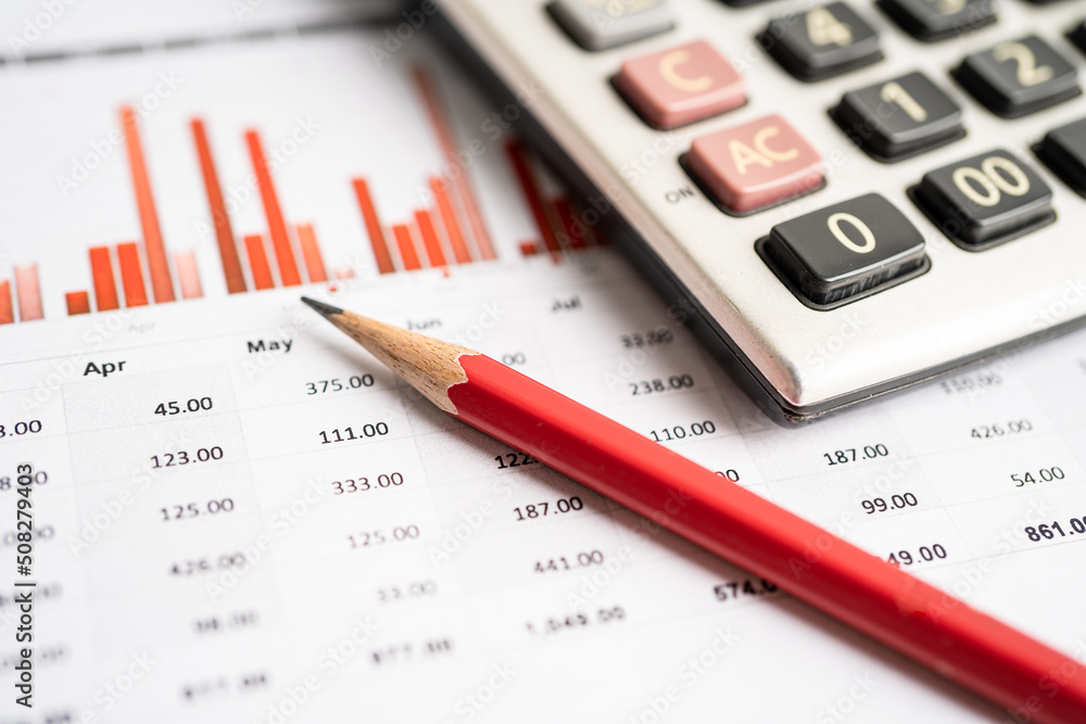 Calculator on preadsheet table paper with graph. Finance development, Banking Account, Statistics Investment Analytic research data economy, trading, office reporting Business company meeting concept. Calculator on preadsheet table paper with graph. Finance development, Banking Account, Statistics Investment Analytic research data economy, trading, office reporting Business company meeting concept.