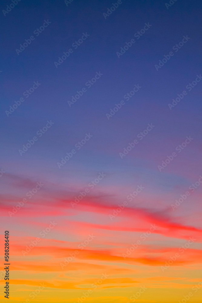 Amazing colorful pink violet blue and purple sunset sky panorama.