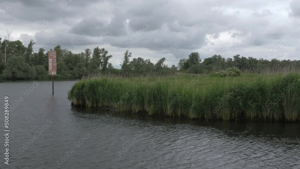 Entrance sign for National Park Biesbosch in the Netherlands, sailing trough nature Entrance sign for National Park Biesbosch in the Netherlands, sailing trough nature