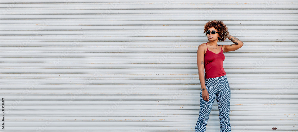 african american girl in summer isolated on the street outdoors african american girl in summer isolated on the street outdoors