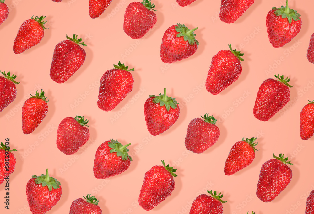 strawberry pattern on peach colour background strawberry pattern on peach colour background