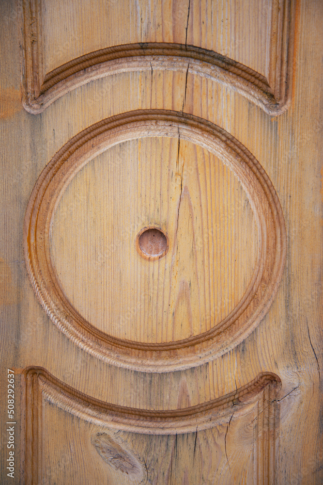 Fototapeta premium Antique oak door with grooves.