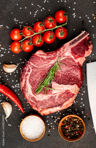 raw beef steak on stone background