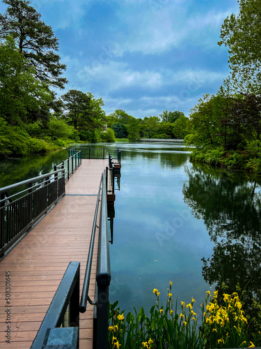 wooden dock at the lake at Lewis Ginter Botanical Garden in Richmond Virginia photo