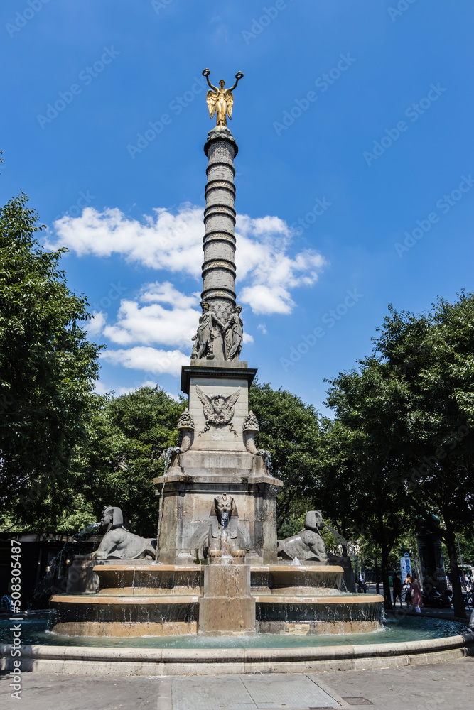 Fontaine du Châtelet - a fountain built in 1808 with a column topped by a Victory statue to celebrate Bonaparte's campaigns, Paris