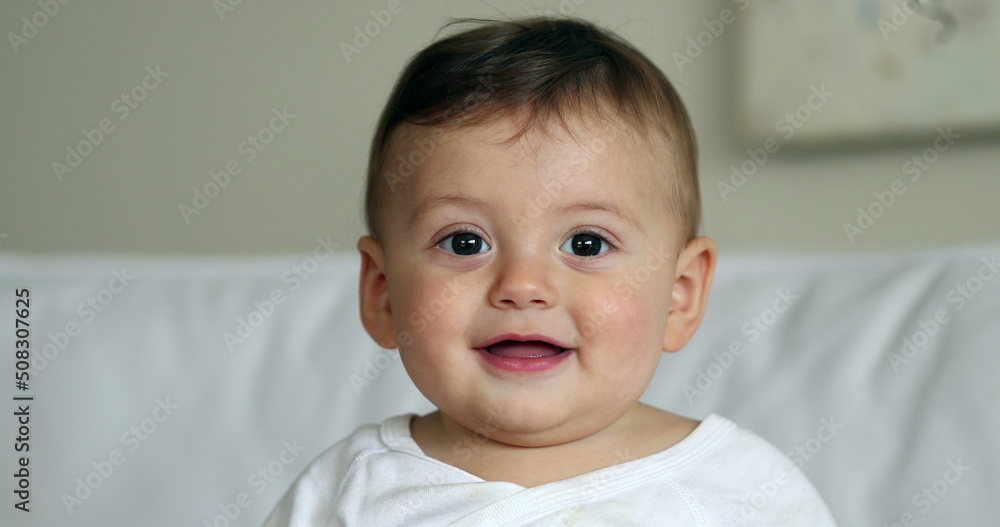 Cute baby toddler child, sweet infant baby boy portrait looking at camera