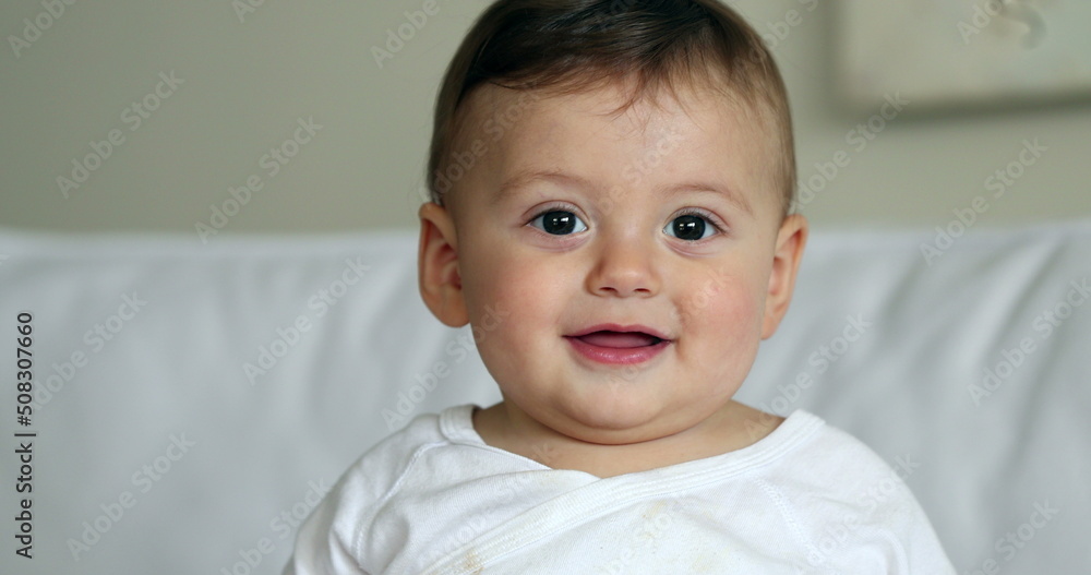 Cute baby toddler child, sweet infant baby boy portrait looking at camera