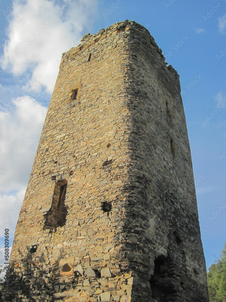 Tower of a medieval castle with sky Tower of a medieval castle with sky