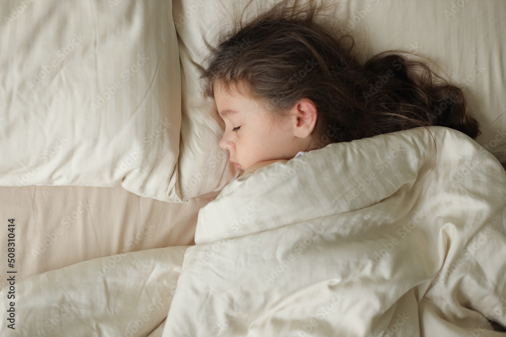 Cute girl sleeping in bed Cute girl sleeping in bed