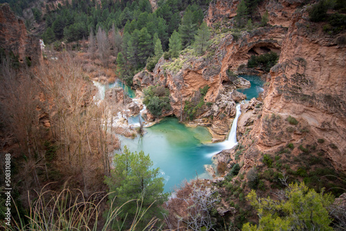 Valokuva Cascade of blue and crystalline waters called Chorreras del Cabriel, declared a