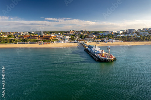 The drone aerial view  of the Bournemouth beach, Observation Wheel and Pier. Bournemouth is a coastal resort town in the Bournemouth, Christchurch and Poole council area of Dorset, England.