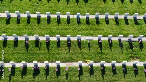 Drone Aerial Above a Military Cemetery Flying Over Rows of Headstones