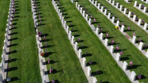 Drone Aerial Rotating Counter Clockwise Around Military Headstones Cemetery