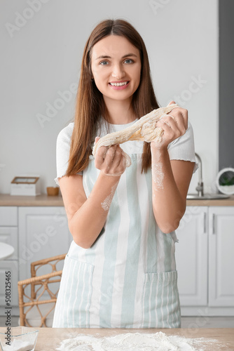 Pretty young woman with raw...